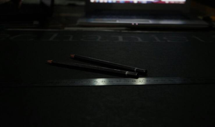 Precision digital caliper instrument on dark surface for exact measurements